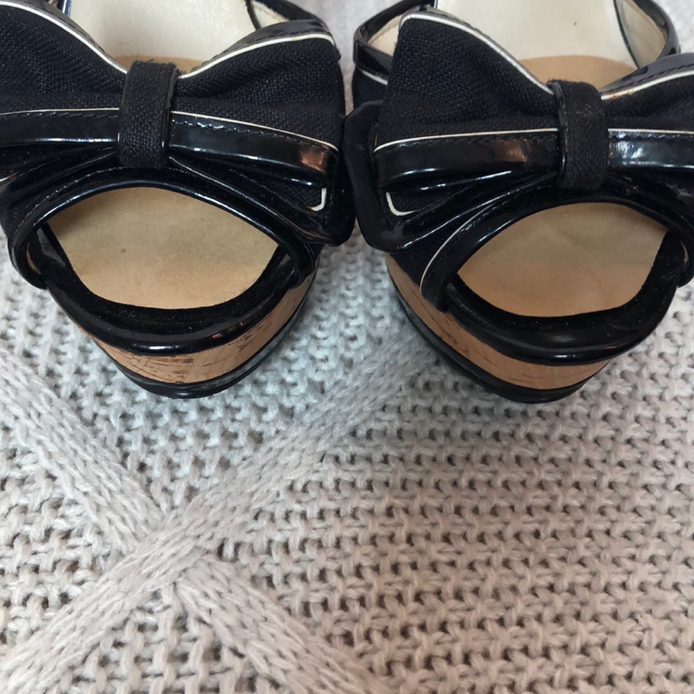 Black platform heels with bow